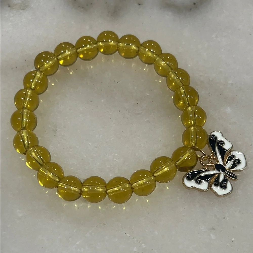 Elegant Yellow Beaded Bracelet with Butterfly Charm